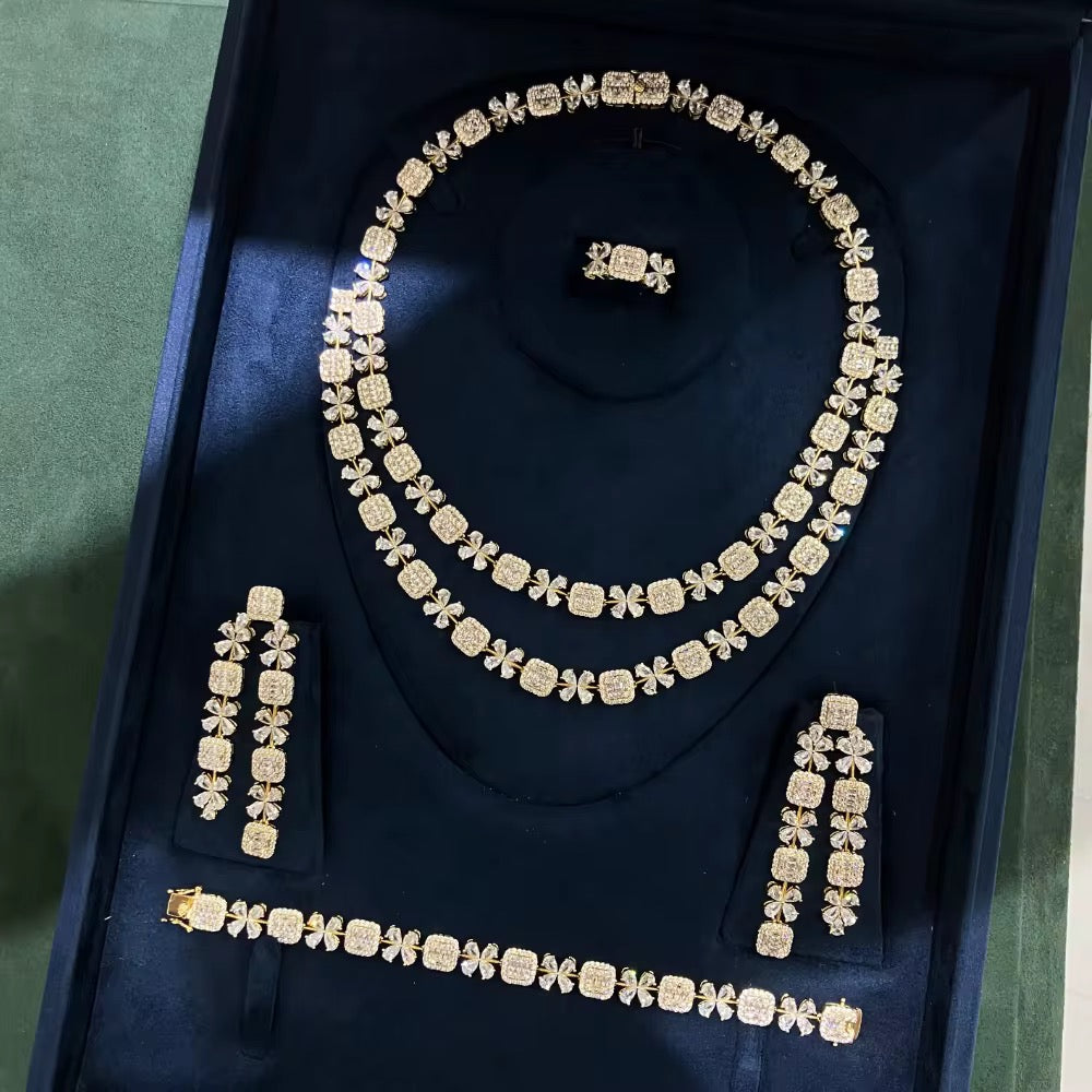 طقم زركون فاخر مطلي بالذهب – بريق وأناقة يدومان